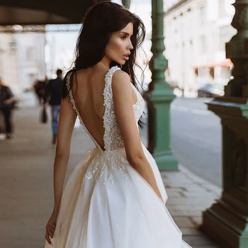 A-line V-kaklo Vestuvių Suknelės 2021 Žavinga Rankovių Appliques Valymo Traukinio Plius Dydis Tiulio Backless Nuotakos Suknelės